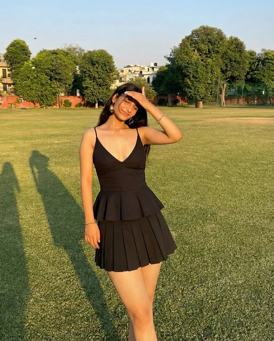 Black Spaghetti Top With Pleated Black Skirt - Image 6